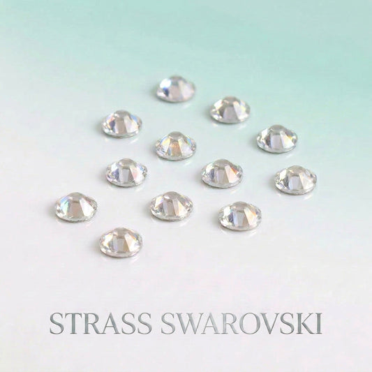 Preciosa vs Swarovski : Quel Cristal Choisir pour tes Strass Dentaires ?
